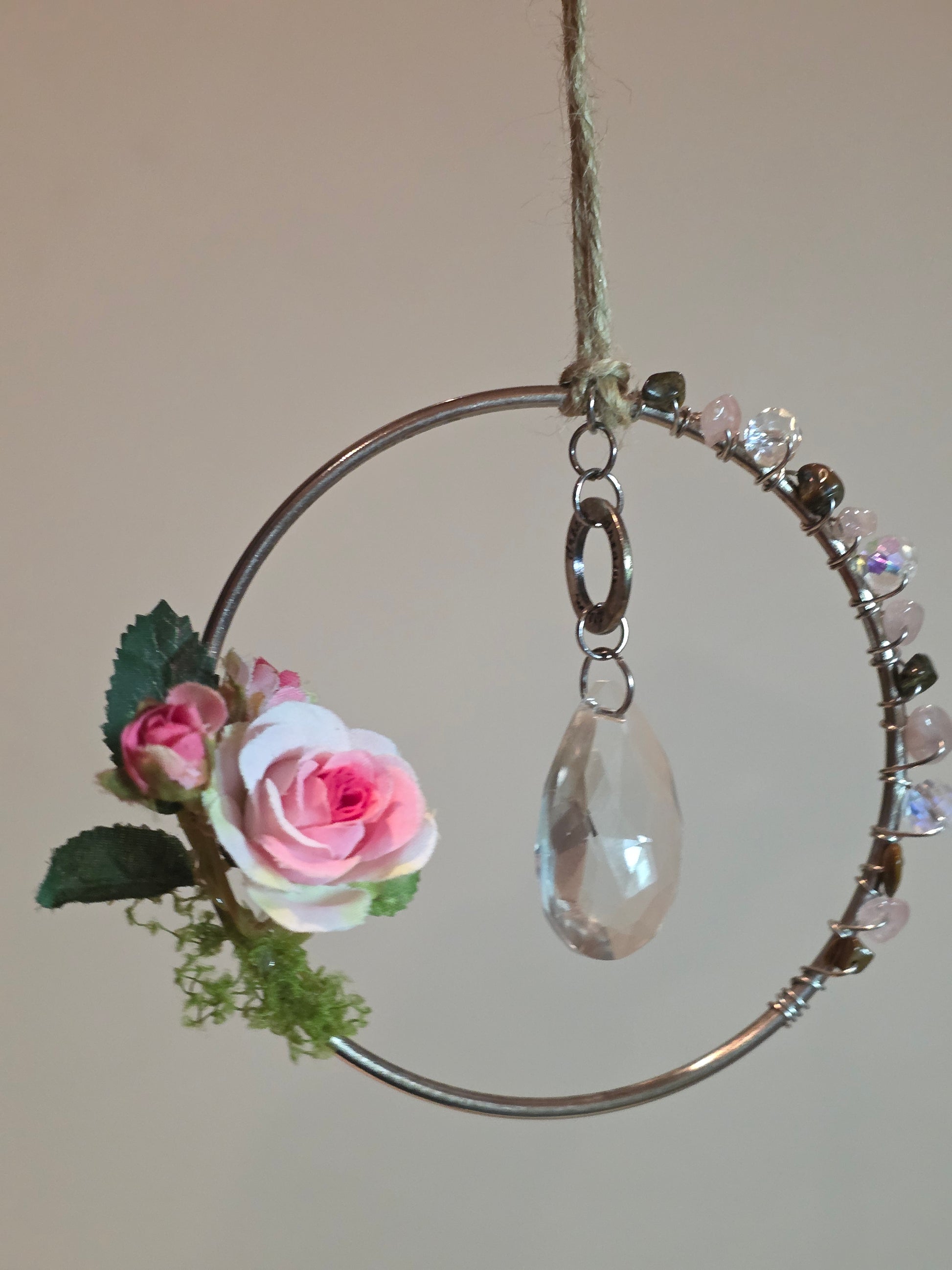 Briar Rose close up of pink English roses and stones